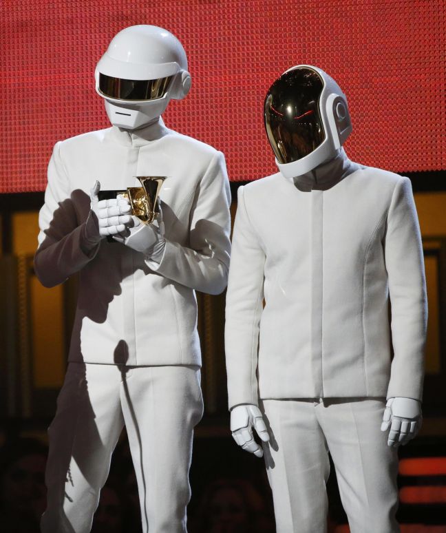 Daft Punk accept the award for record of the year for "Get Lucky" at the 56th annual Grammy Awards in Los Angeles
